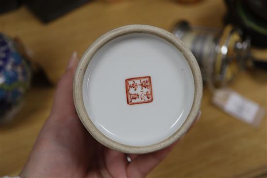 A Middle Eastern pot, a pair of pewter vases, three lacquer stacking boxes and a Chinese porcelain pot